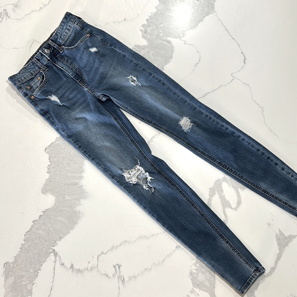 Distressed high rise skinny jeans